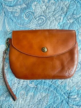 PATRICIA NASH COGNAC LEATHER WRISTLET